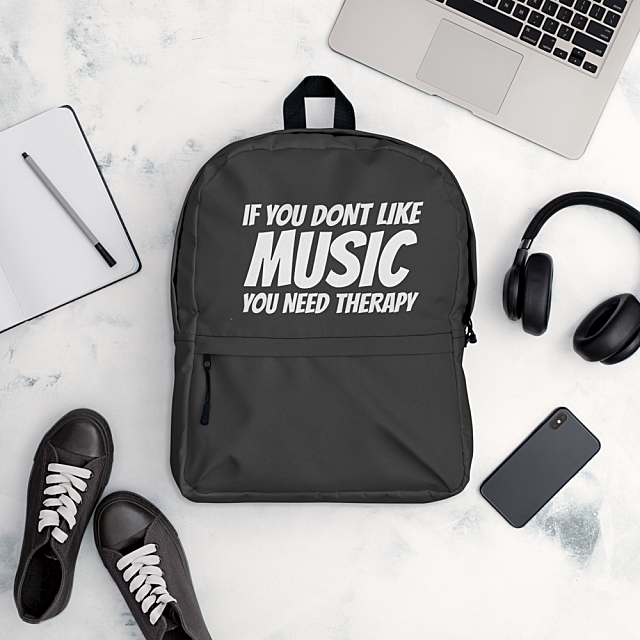 Water resistant black medium size school backpack with saying If you dont love music you need therapy. For daily use or sports activities. The pockets (including one for your laptop) give plenty of room for all your necessities.